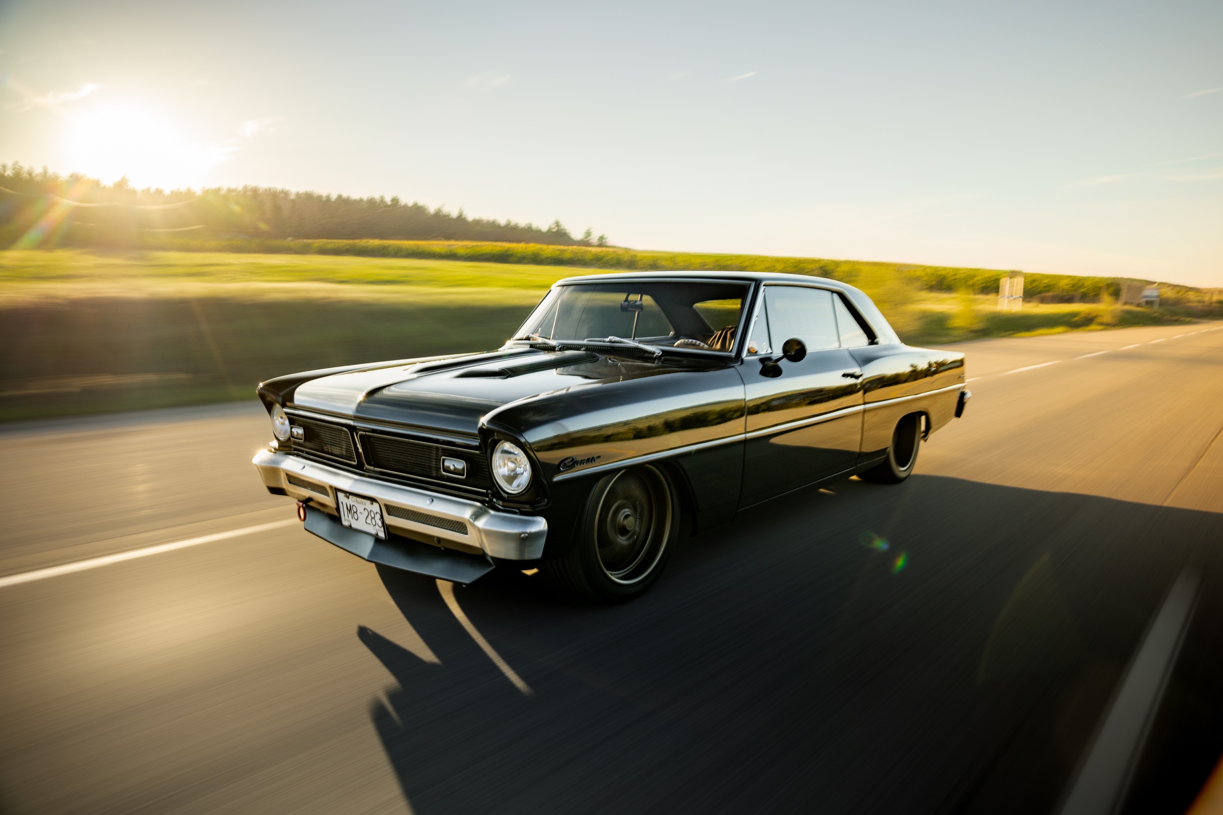 1967 Acadian Canso restomod rolling through warm sunset light