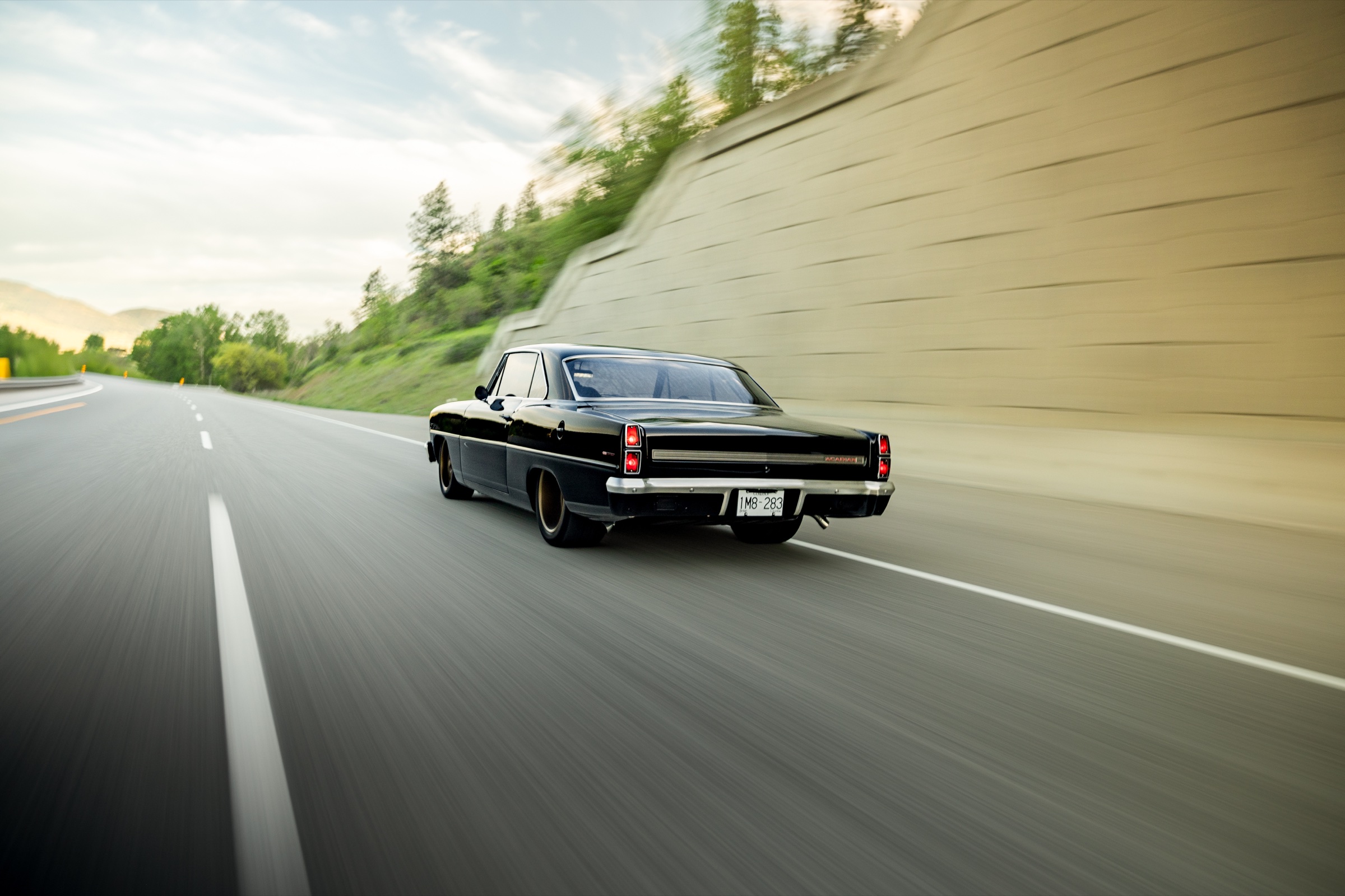 Rear rolling view of the 1967 Acadian Canso restomod