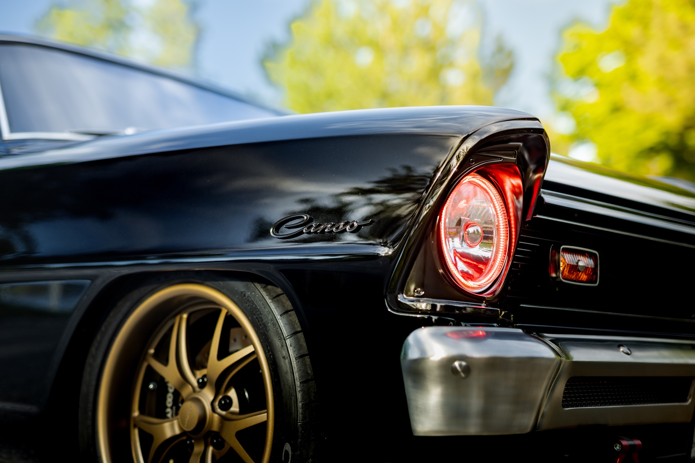 Canso script, custom wheel, and illuminated headlight detail