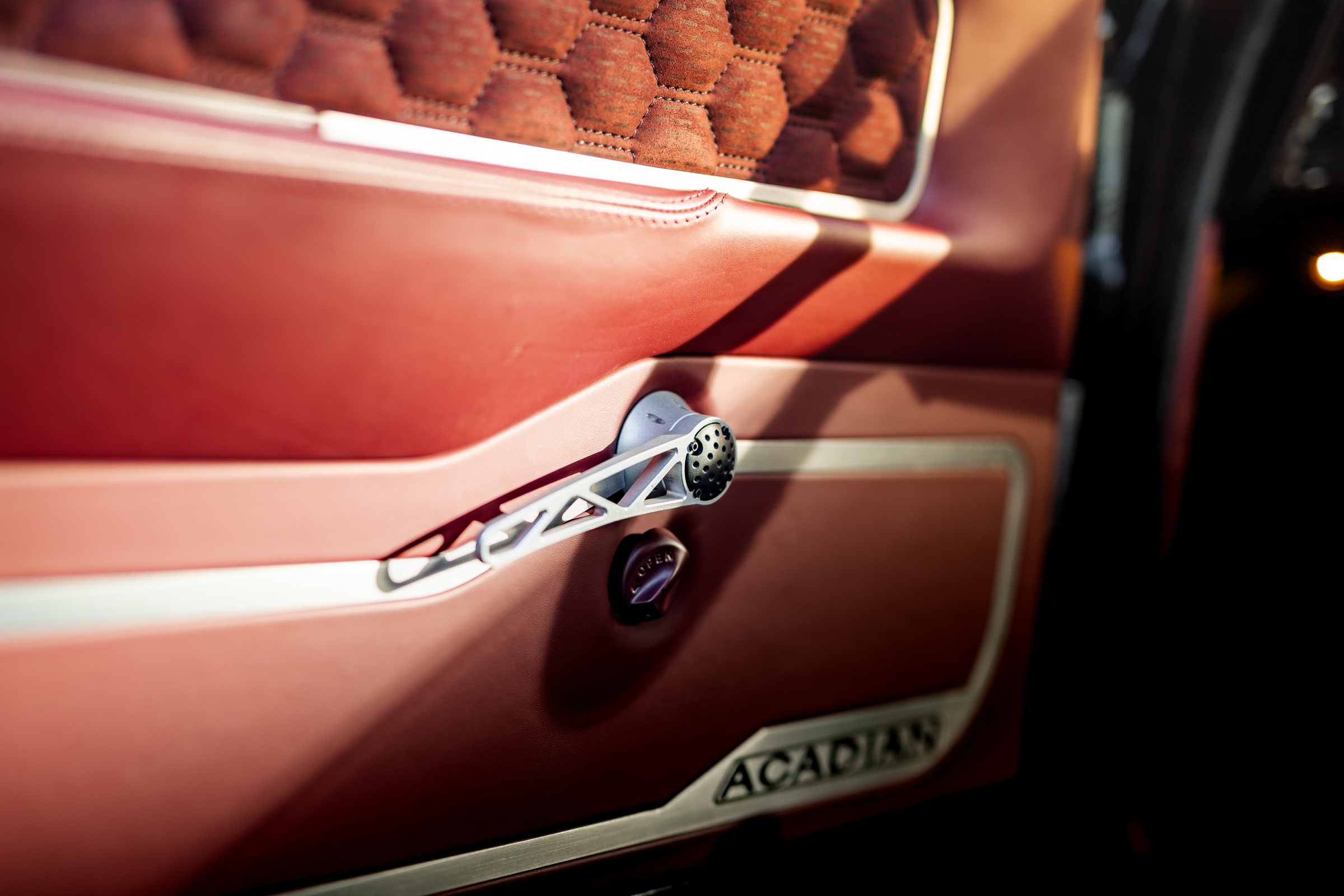 Burgundy Acadian Canso door panel and custom handle detail