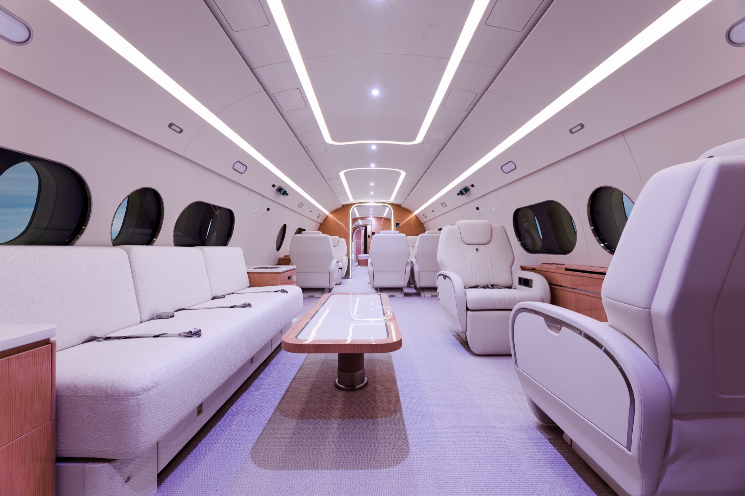 Wide view through the ACJ220 lounge and forward cabin