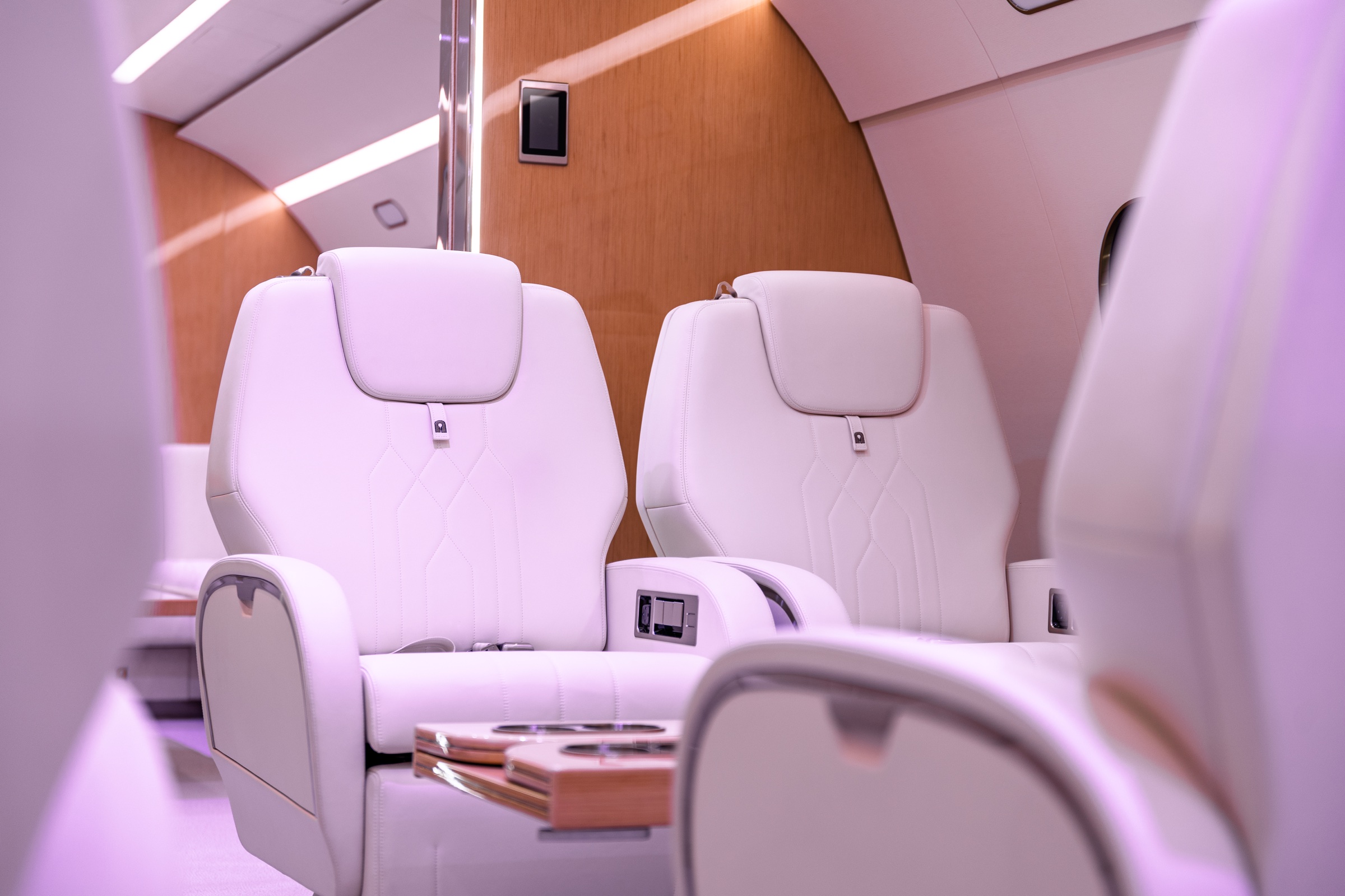 Pair of ACJ220 seats framed by the cabin architecture