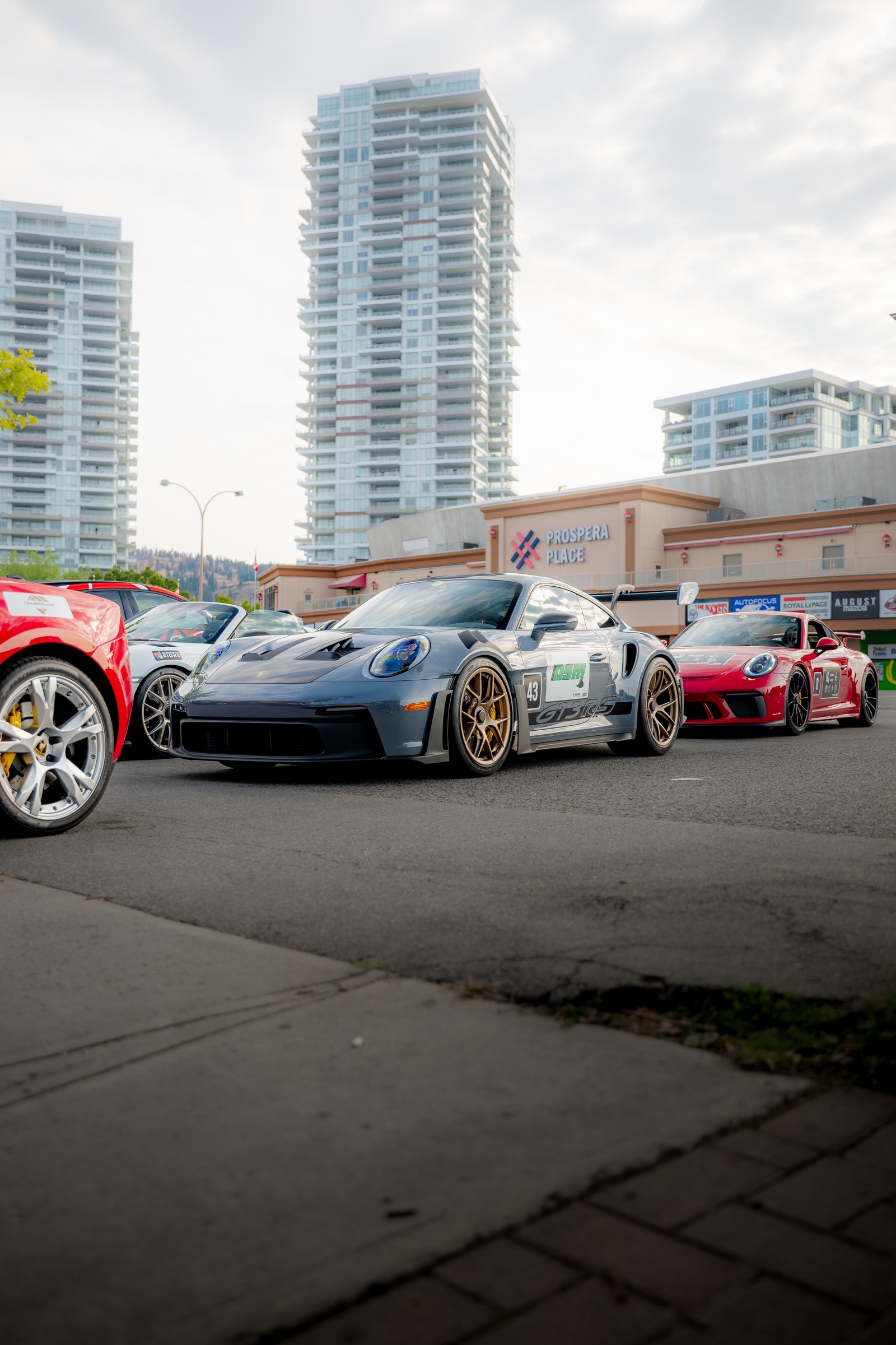 Porsche 911 GT3 RS cars assembled outside Prospera Place