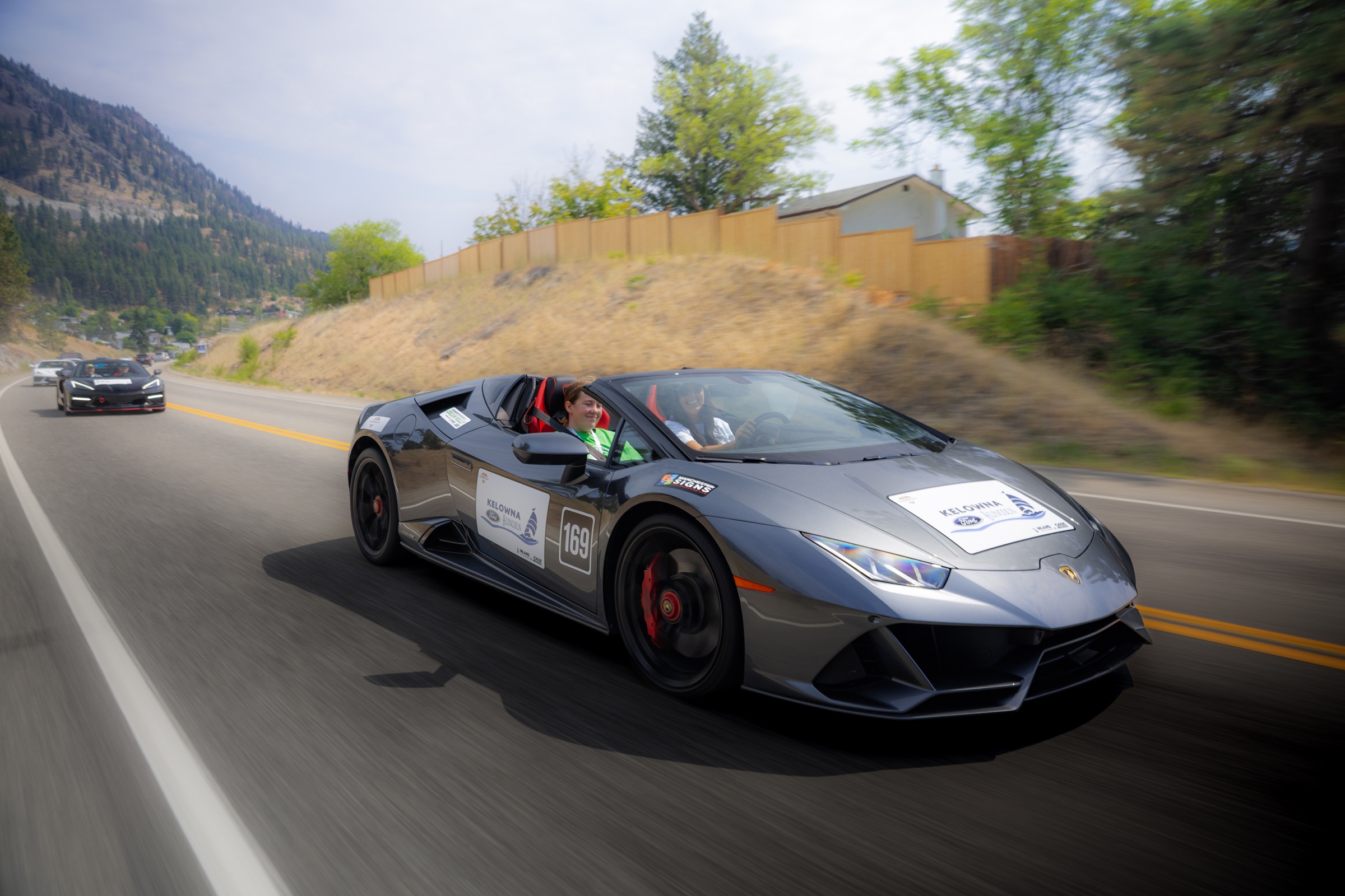 Grey Lamborghini Huracan Spyder carrying a Dream Rally co-pilot