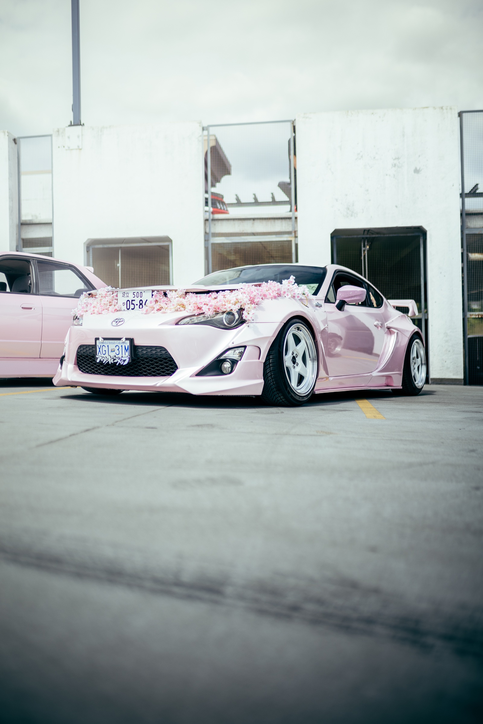 Pink Toyota 86 decorated with cherry blossoms