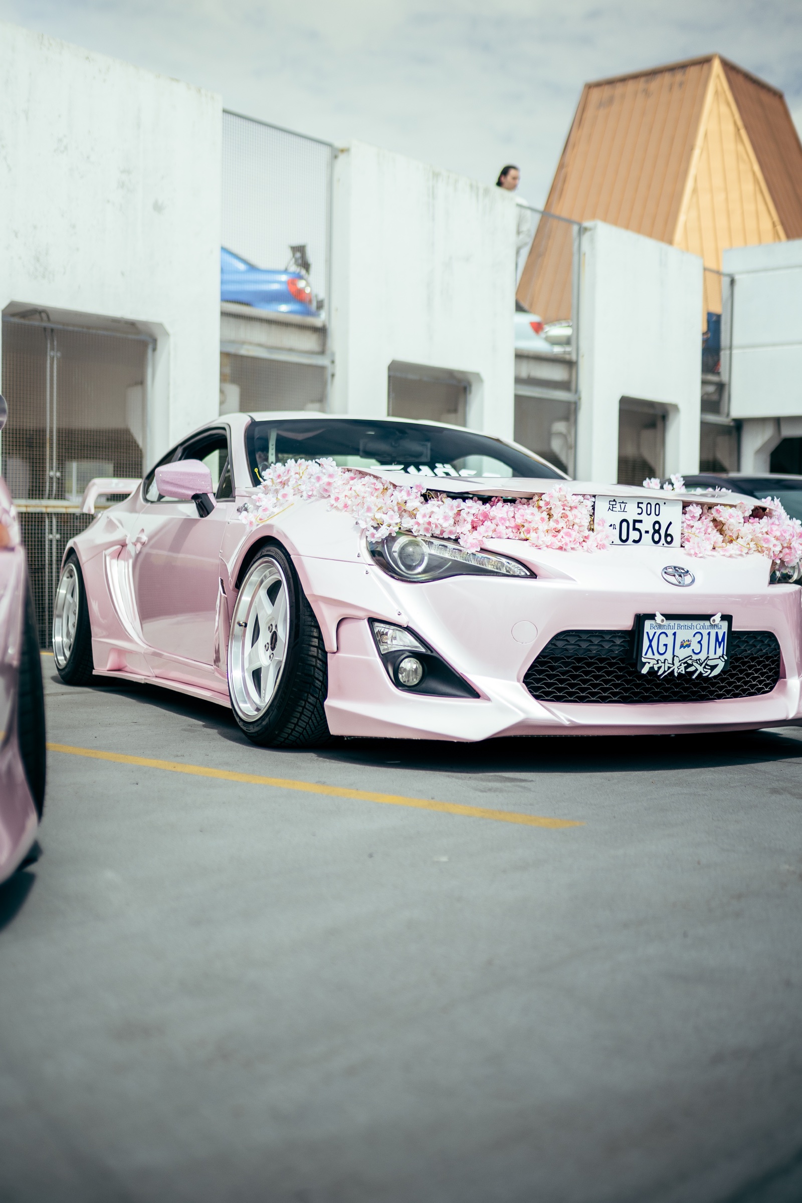 Pink Toyota 86 with cherry-blossom display details