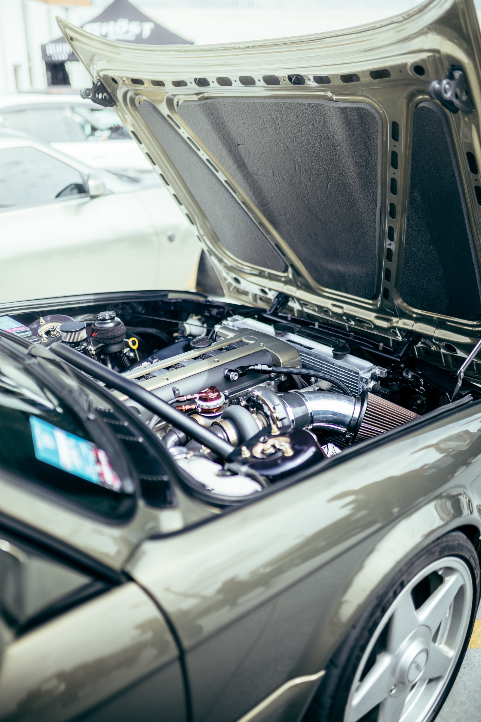 Turbocharged engine bay displayed at Driven Vancouver 2025
