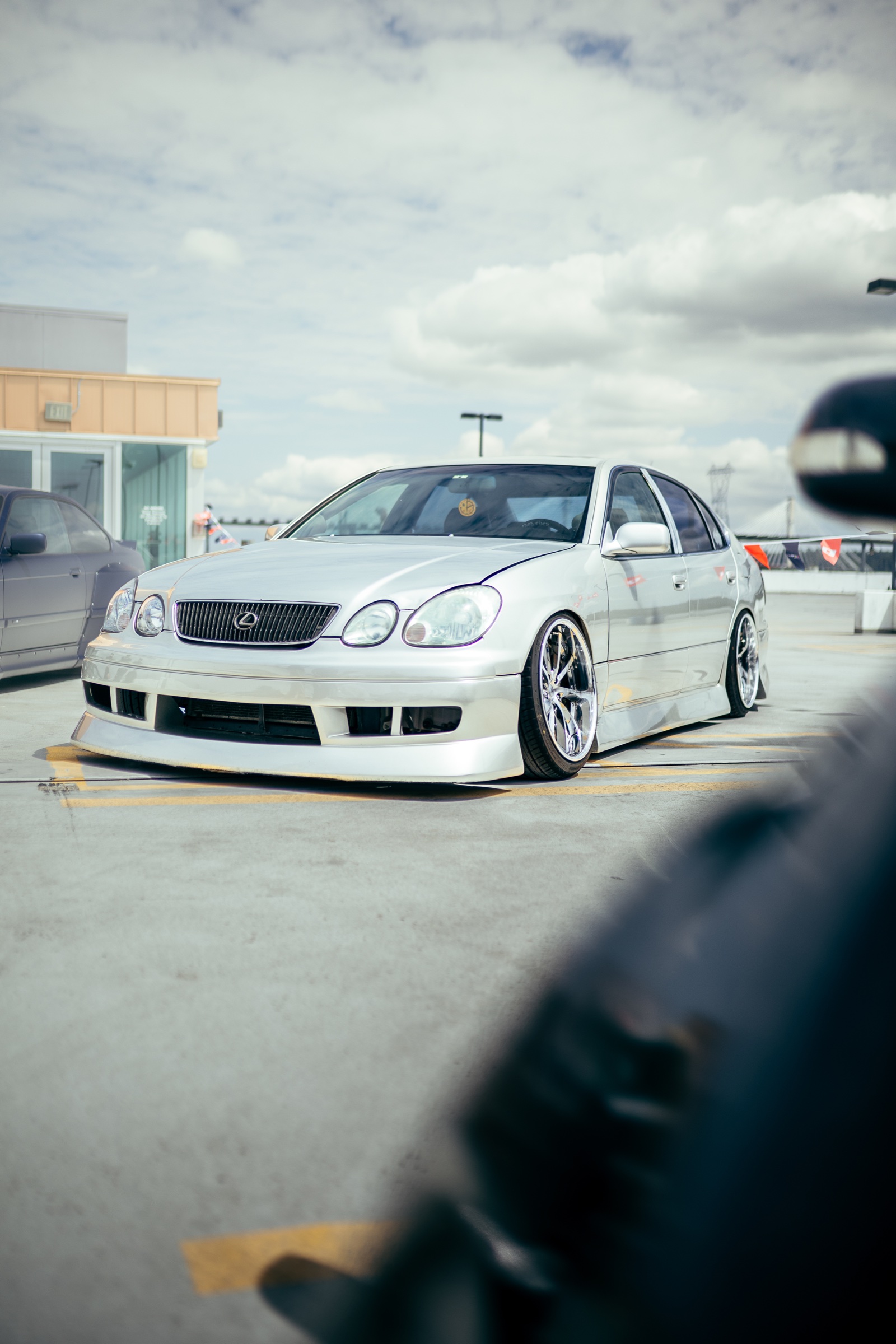 White lowered Lexus GS on the Driven Vancouver rooftop