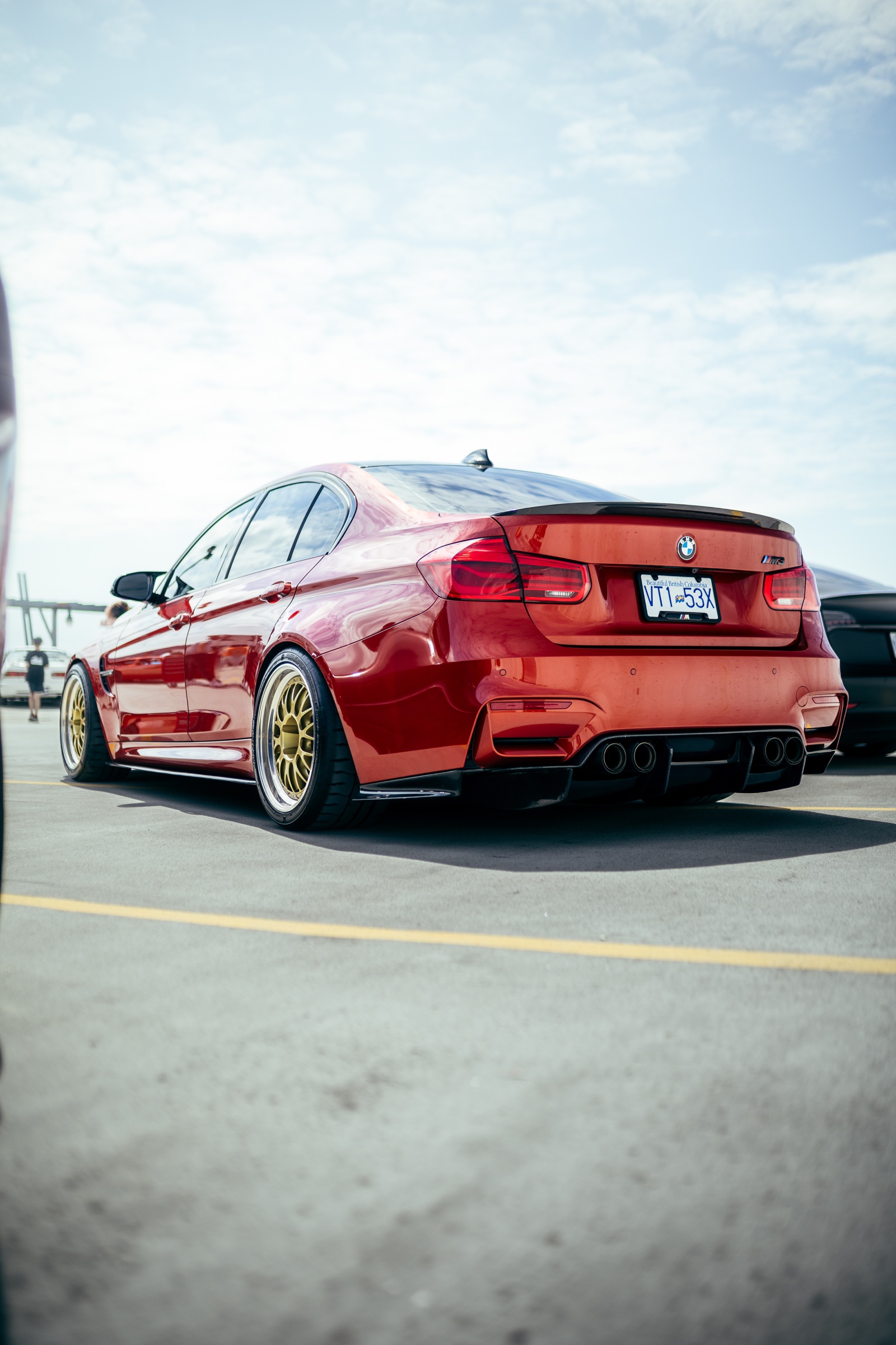 Rear three-quarter view of a red BMW M3