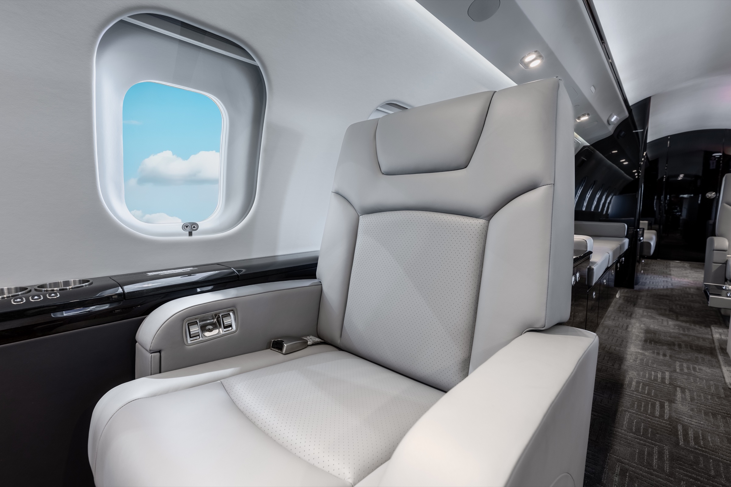 Global 6000 passenger seat beside the cabin window