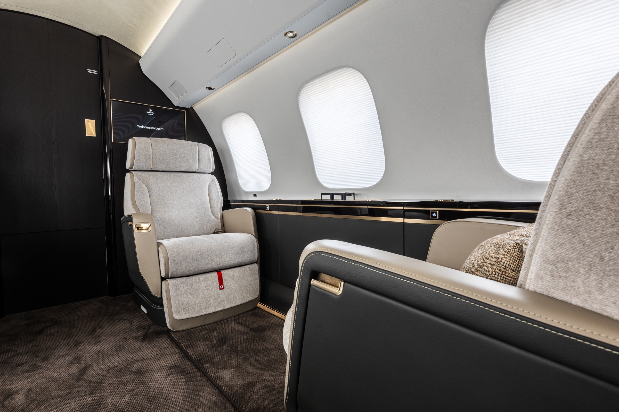 Global 7500 private seating area beneath the cabin windows