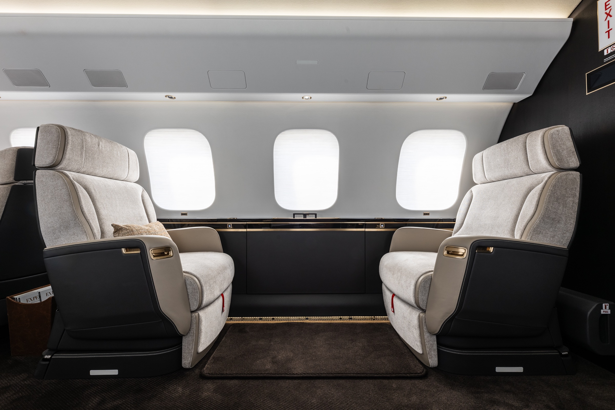 Global 7500 facing club seats beneath three cabin windows