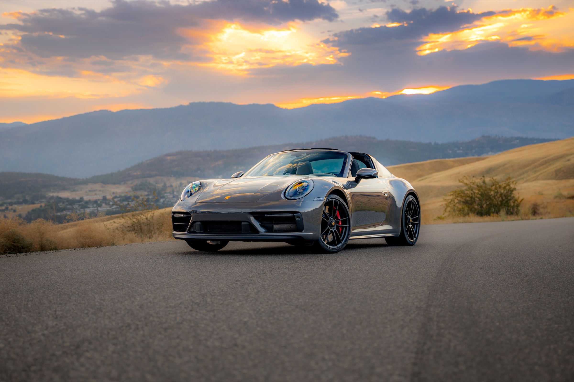 Porsche 911 Targa 4 GTS photographed against the sunrise