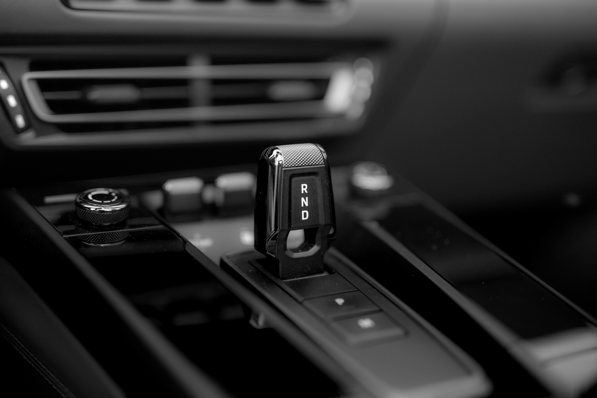 Black-and-white detail of the Porsche 911 gear selector