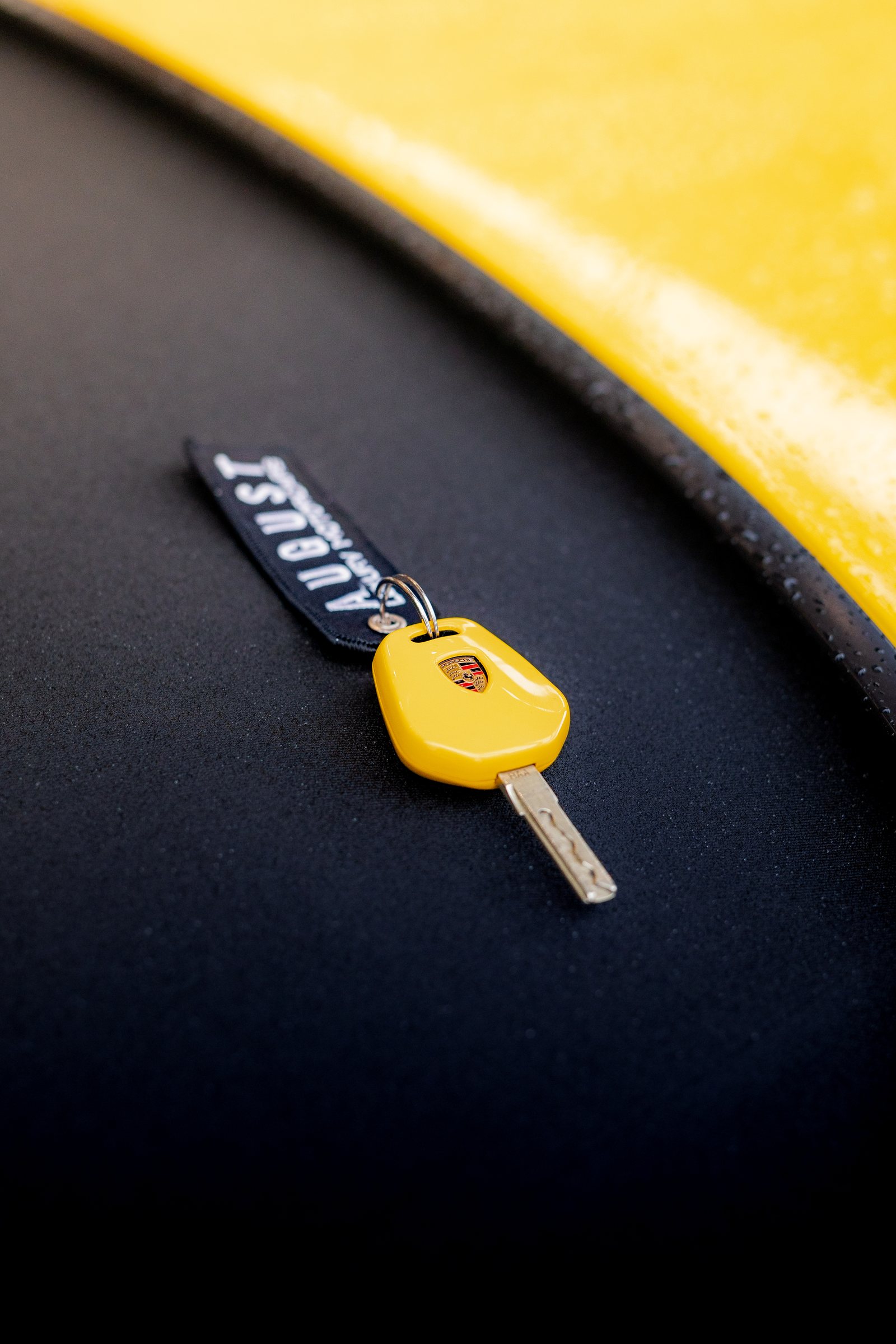 Yellow Porsche key photographed during the club gathering