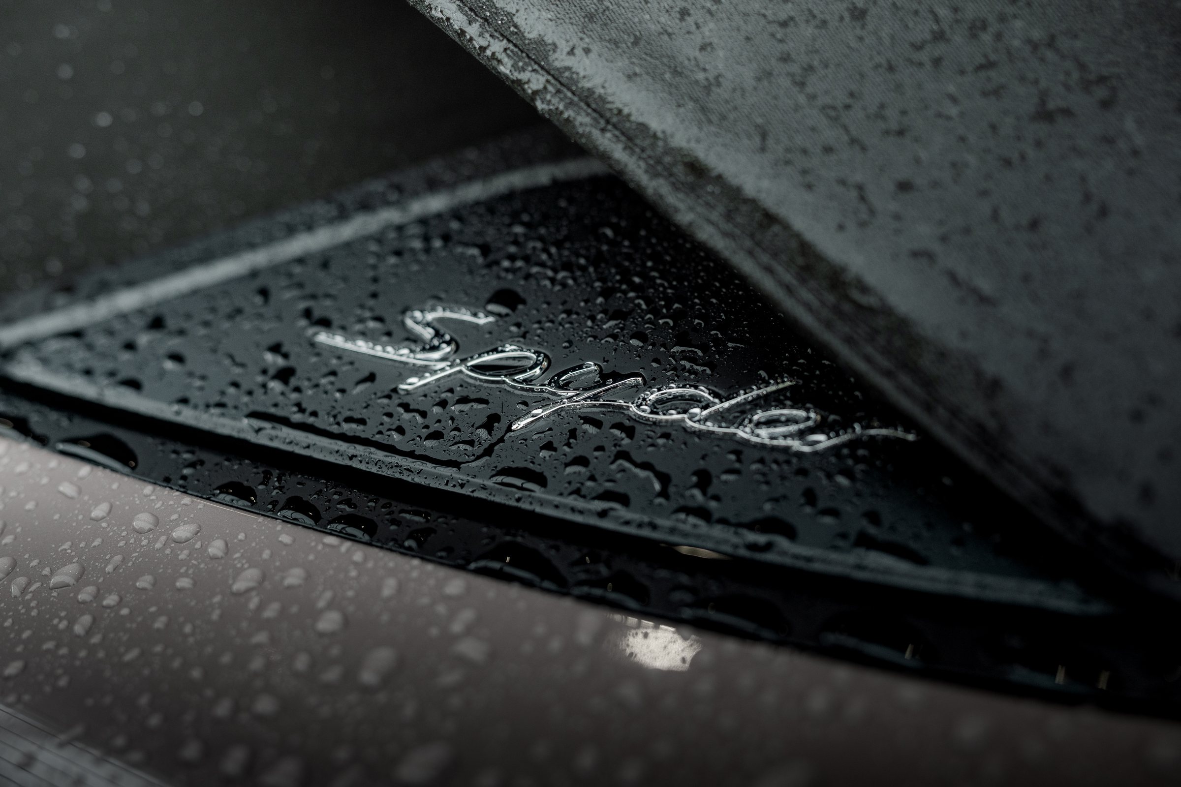 Porsche Speedster script photographed in the rain